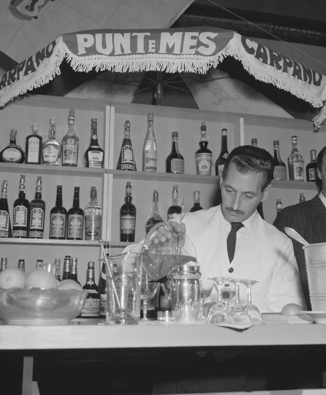 A classic bartender at work — the craft tradition behind the bar